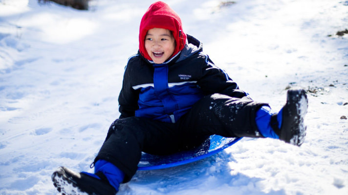 child on sled