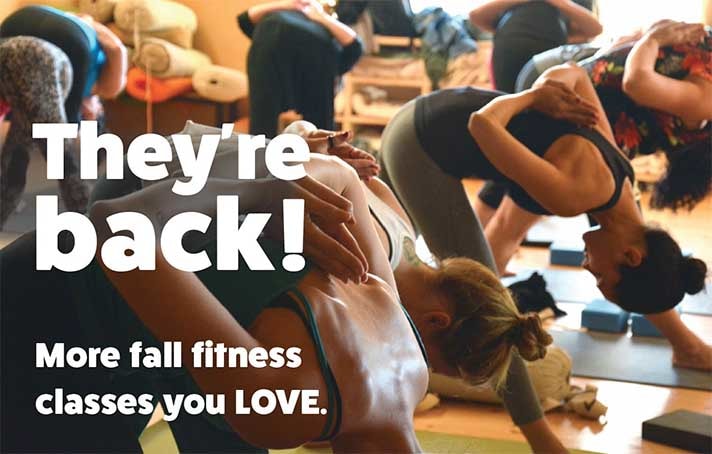 yoga students posing in class