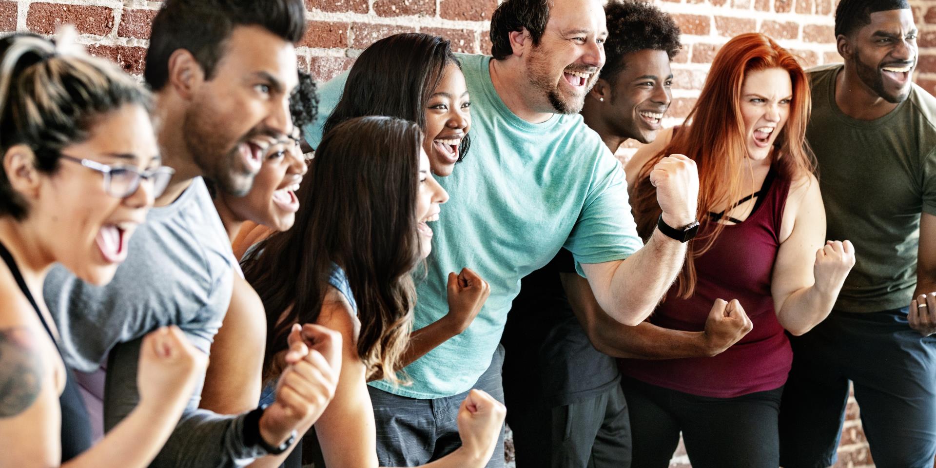 group of people flexing for camera