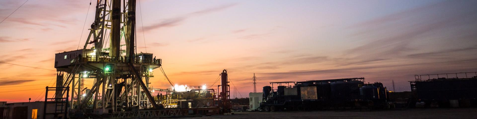 Drill equipment at an oil and gas well drilling site.