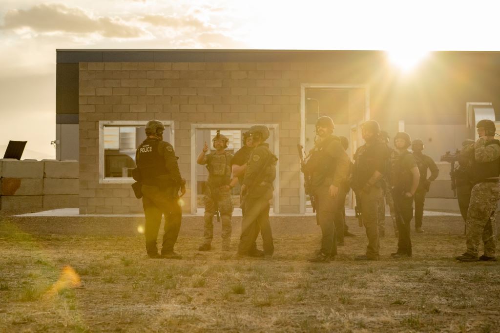 SWAT team at a training building in sunlight