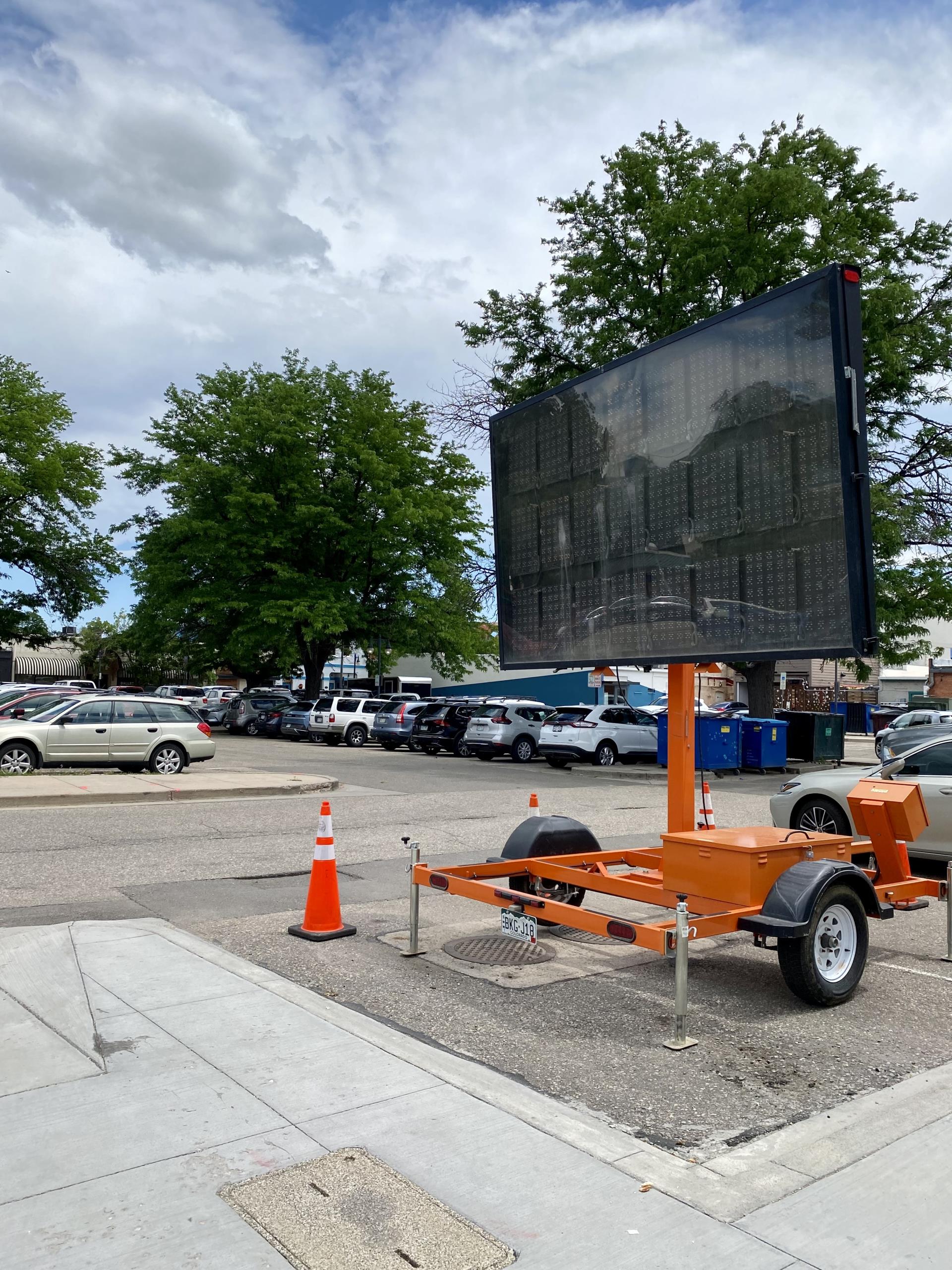 A message board at the E. 5th Street and Lincoln Avenue public parking lot